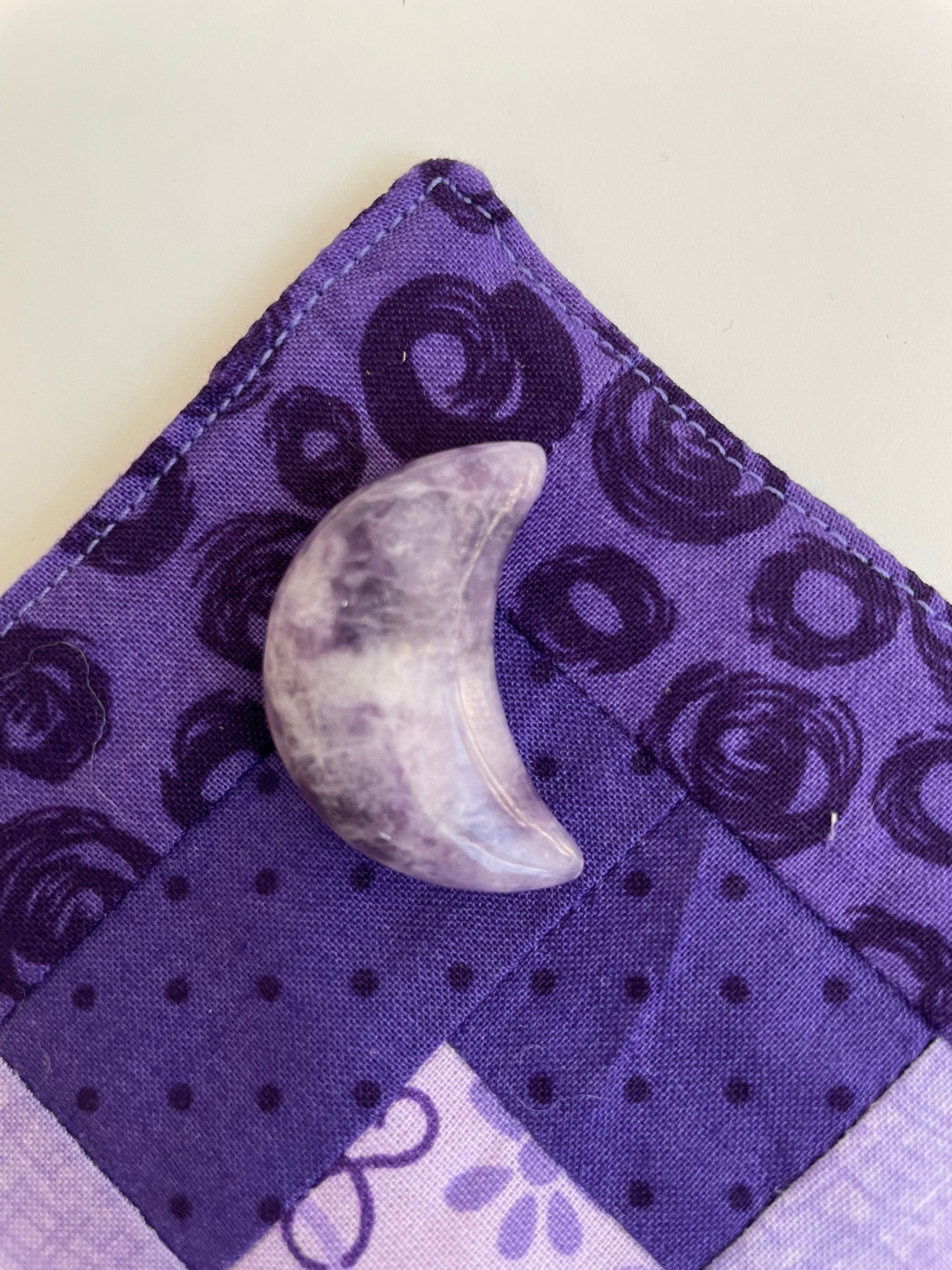 This sparkly little lavender colored lepidolite crescent moon can be used for meditation, healing, for your altar, on/near your computer or as décor for any room in your home or office. Easy to slip right into your pocket so you can take the energy of lepidolite everywhere you go.  Approx. 1¼". Cost is $6. 
