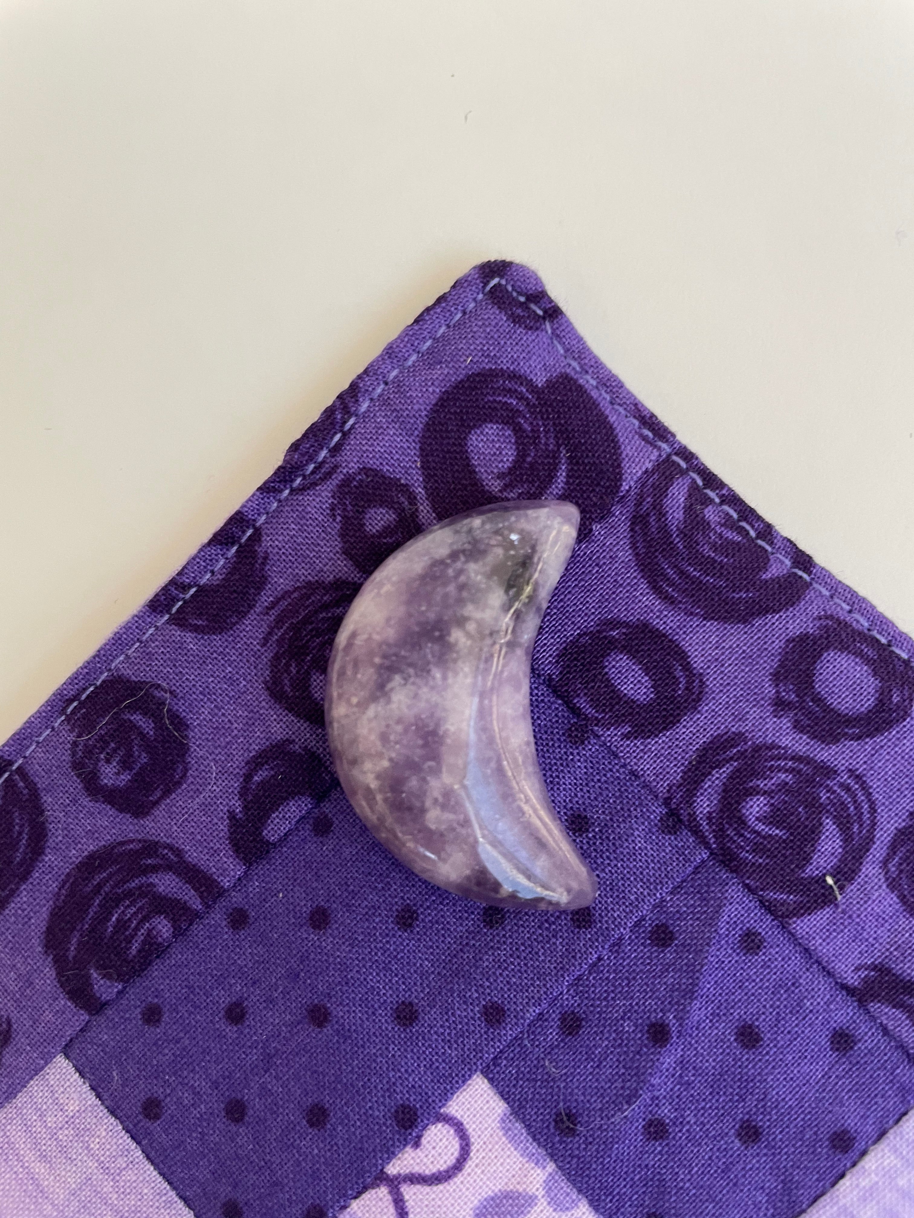 ﻿This sparkly little lavender-colored lepidolite crescent moon can be used for meditation, healing, for your altar, on/near your computer or as décor for any room in your home or office. Easy to slip right into your pocket so you can take the energy of lepidolite everywhere you go. Approx. 1¼". Cost is $6. 