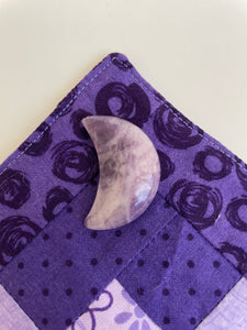 ﻿This sparkly little lavender-colored lepidolite crescent moon can be used for meditation, healing, for your altar, on/near your computer or as décor for any room in your home or office. Easy to slip right into your pocket so you can take the energy of lepidolite everywhere you go.  Approx. 1¼". Cost is $6. 