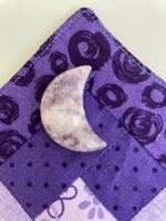 Load image into Gallery viewer, This sparkly little lepidolite crescent moon can be used for meditation, healing, for your altar, on/near your computer or as décor for any room in your home or office. Easy to slip right into your pocket so you can take the energy of lepidolite everywhere you go. Approx. 1¼&quot;. Cost is $6.
