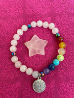 Load image into Gallery viewer, This sweet little rose quartz crystal star can be used for meditation, healing, as an altar piece or as décor for any room in your home or office. Makes a wonderful gift too! Easy to slip right into your pocket so you can take the energy of rose quartz wherever you go! Rose quartz is the &quot;stone of unconditional love &amp; infinite peace.&quot; (Judy Hall). Approx. 1¼&quot;. Cost is $6. 
