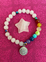 Load image into Gallery viewer, Reverse side of rose quartz star. This sweet little rose quartz crystal star can be used for meditation, healing, as an altar piece or as décor for any room in your home or office. Makes a wonderful gift too! Easy to slip right into your pocket so you can take the energy of rose quartz wherever you go! Rose quartz is the &quot;stone of unconditional love &amp; infinite peace.&quot; (Judy Hall). Approx. 1¼&quot;. Cost is $6.
