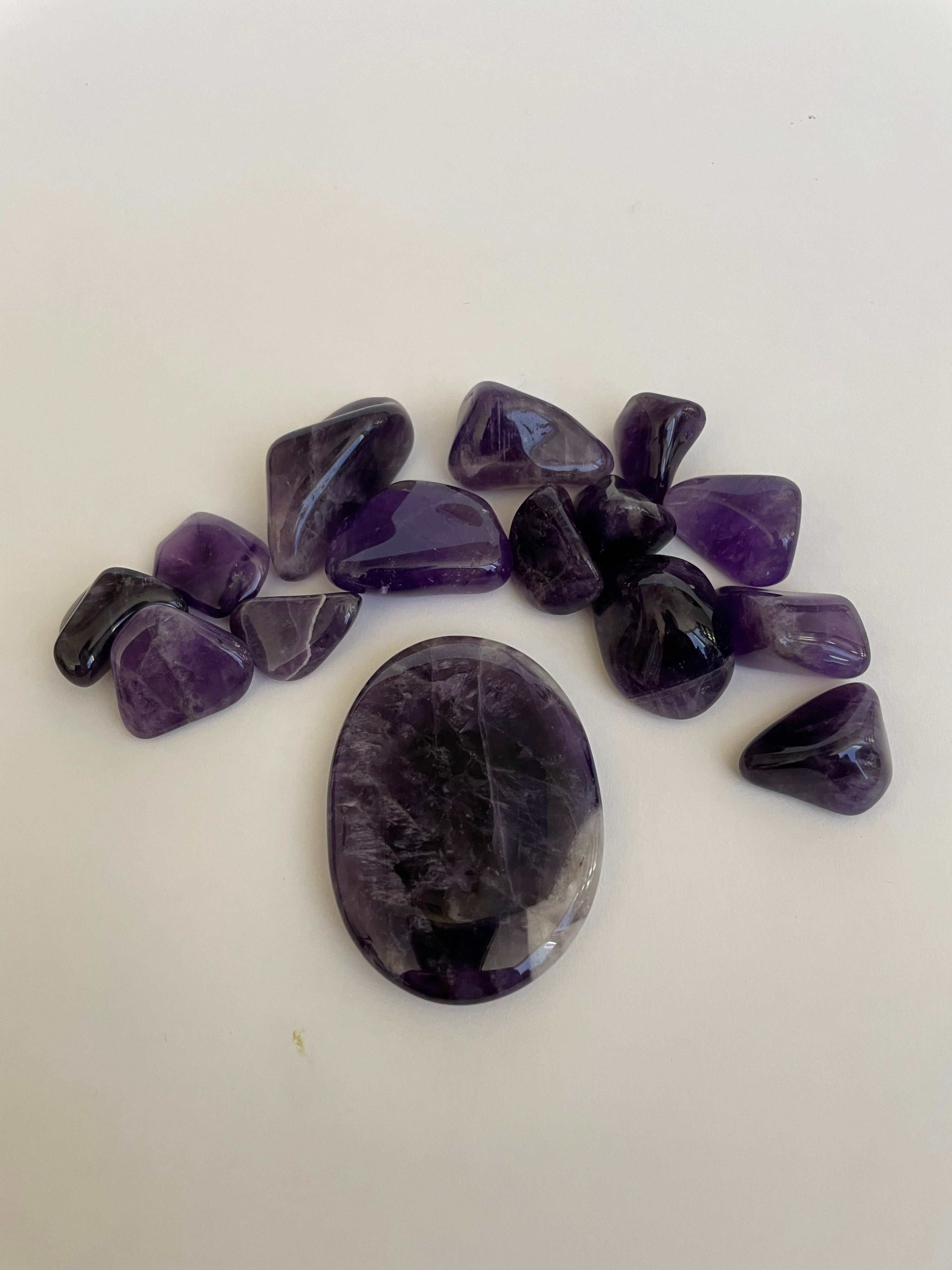 Other side of Chevron amethyst palm stone. Beautiful amethyst palm stone can be used for meditation, healing, for your altar or as a décor item. Amethyst, one of the most spiritual gemstones, heals, cleanses & calms, allowing you to reach meditative & higher consciousness levels more easily. It also helps to dispel negative emotional states and more. Chevron amethyst is a combination of amethyst and white quartz and when you add the quartz you get additional qualities. 2" long. Cost $12.