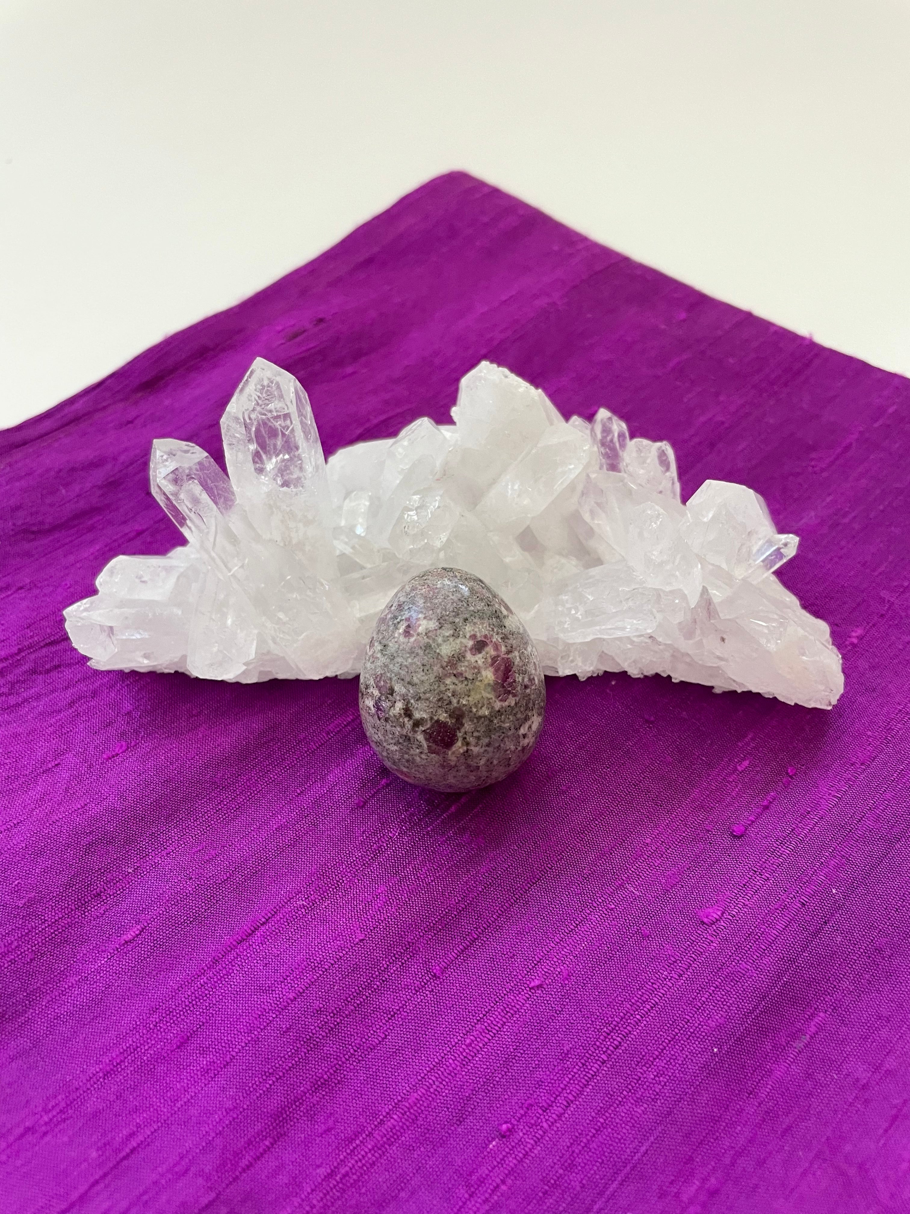 This gorgeous ruby in matrix egg is perfect for your altar, for healing, to hold during meditation, or as décor in your home or office. It consists of rubies set in their natural stone matrix or base. Ruby balances the heart & increases energy levels. It is a stone of love and passion and sexuality. It protects against psychic attack. It is a stone of prosperity. It enhances courage and leadership and much more. This sphere weighs 5.1 oz (144.58 grams) and is approximately 5¾" in circumference. Cost $9.