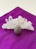 Load image into Gallery viewer, This gorgeous ruby in matrix egg is perfect for your altar, for healing, to hold during meditation, or as décor in your home or office. It consists of rubies set in their natural stone matrix or base. Ruby balances the heart &amp; increases energy levels. It is a stone of love and passion and sexuality. It protects against psychic attack. It is a stone of prosperity. It enhances courage and leadership and much more. This sphere weighs 5.1 oz (144.58 grams) and is approximately 5¾&quot; in circumference. Cost $9.
