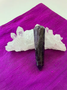 Alternate view. Gorgeous, 16-sided amethyst healing wand, with stunning craftsmanship. This high quality, deep purple amethyst wand can be used for healing and works especially well for "people recovering from any type of poor health - emotional, mental, physical or spiritual "and can aid in finding one's true path (ravenscrystals.com). It is approx. 3½" long. Cost is $30.