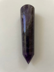 Alternate view. Gorgeous, 16-sided amethyst healing wand, with stunning craftsmanship. This high quality, deep purple amethyst wand can be used for healing and works especially well for "people recovering from any type of poor health - emotional, mental, physical or spiritual "and can aid in finding one's true path (ravenscrystals.com). It is approx. 3½" long. Cost is $30.
