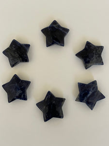 Yet another view of several sodalite stars. This powerful little sodalite crystal star can be used for meditation, healing, as an altar piece or as décor for any room in your home or office. Makes a wonderful gift too! Easy to slip right into your pocket so you can take the energy of sodalite wherever you go! Sodalite "Unites logic with intuition and opens spiritual perception" (Judy Hall). Approx. 1¼". Cost is $6 for one star.