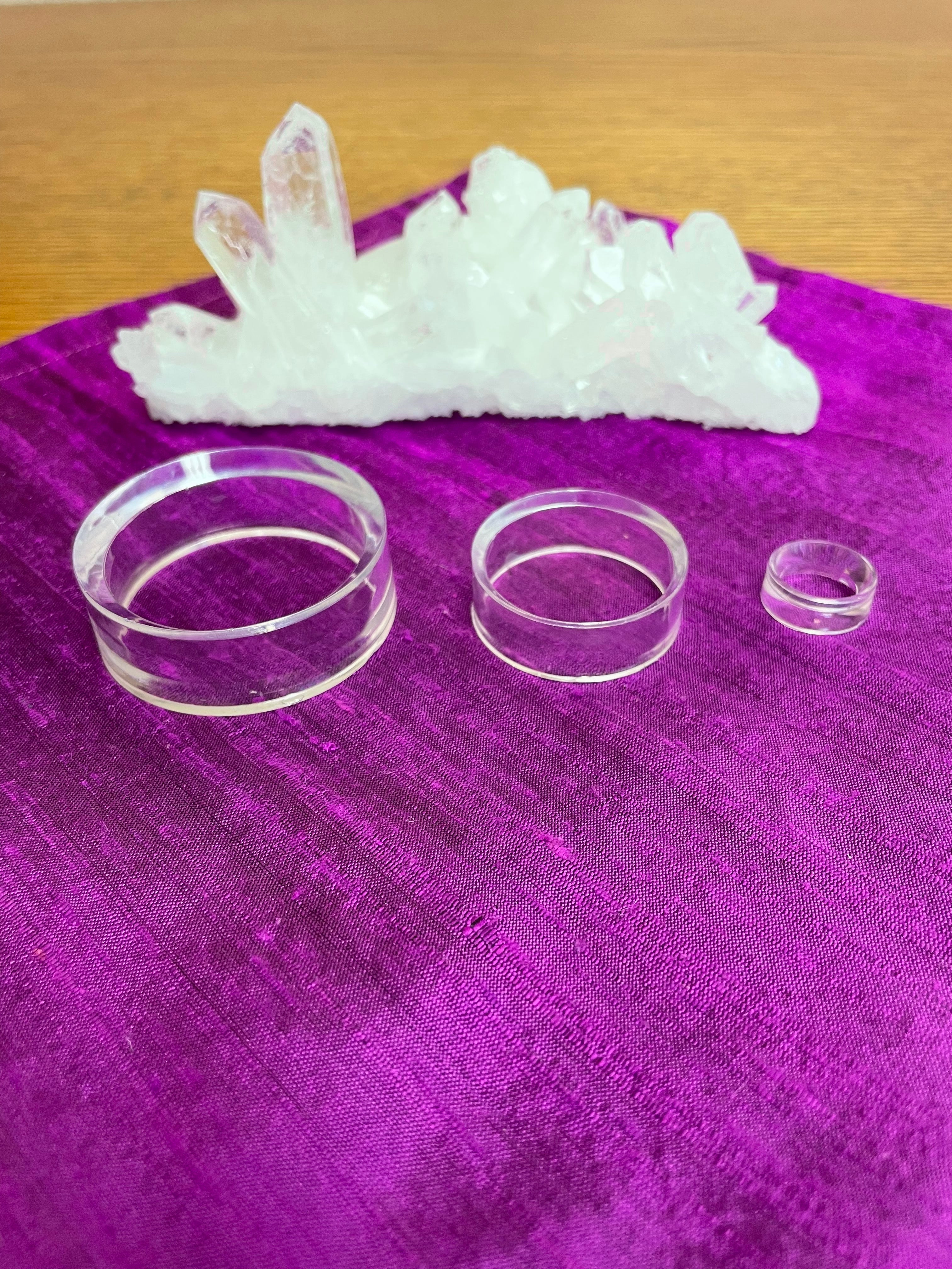 All 3 sizes.  Your basic clear plastic ring to display crystal spheres or eggs. Use to keep your crystal spheres and eggs in place, rather than rolling off your altar, table or nightstand - lol. This is the largest size I have at approximately 1.8"x 06" (d/h). The 3rd photo shows all three sizes I offer. Check out my crystal spheres and my ruby-in-matrix eggs and Judy Hall's The Crystal Bible Books - they are awesome! Cost is $1.00 for the large size (and must be purchased as an add-on item).