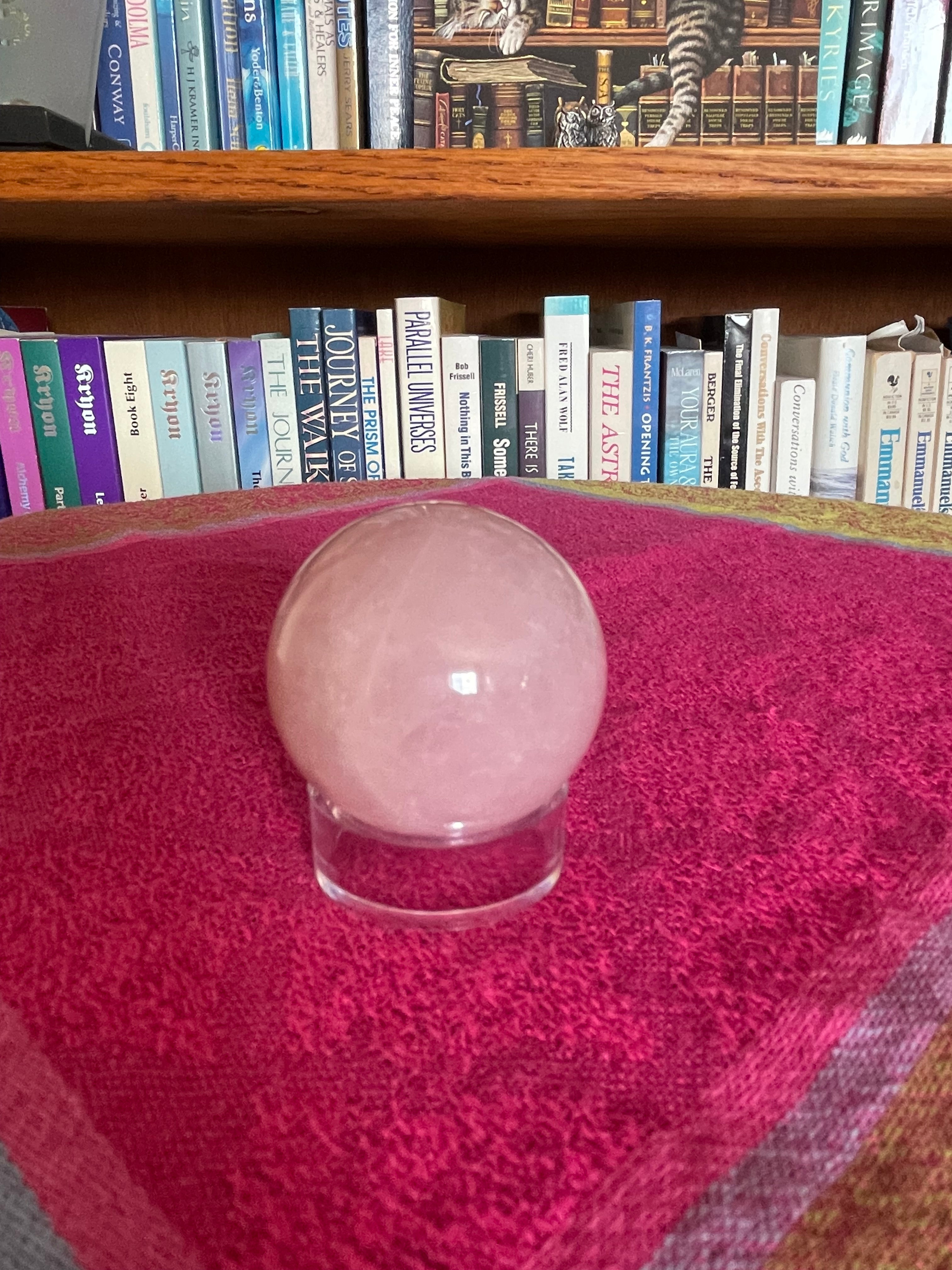 Display with sphere. Your basic clear plastic ring to display crystal spheres or eggs. Use to keep your crystal spheres and eggs in place, rather than rolling off your altar, table or nightstand - lol. This is the medium size I have at approximately 1.26"x0.43" (d/h). The 3rd photo shows all three sizes I offer. Check out my crystal spheres and my ruby-in-matrix eggs and Judy Hall's The Crystal Bible Books - they are awesome! Cost of sphere display ring is 75 cents and can only be bought as an add-on item).