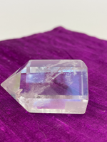 Load image into Gallery viewer, Beautiful clear crystal point holds both beauty and meaning. Quartz is the &quot;most powerful healing and energy amplifier on the planet&quot; (Judy Hall). It is cleansing to organs of the physical body and It also cleanses the soul and it increases your spiritual energy to the highest level (and so much more). Place this on your altar, book shelf, nightstand or table. Use for meditation, healing, cleansing and more. Point is approximately 1½&quot; tall. Cost $10.98.
