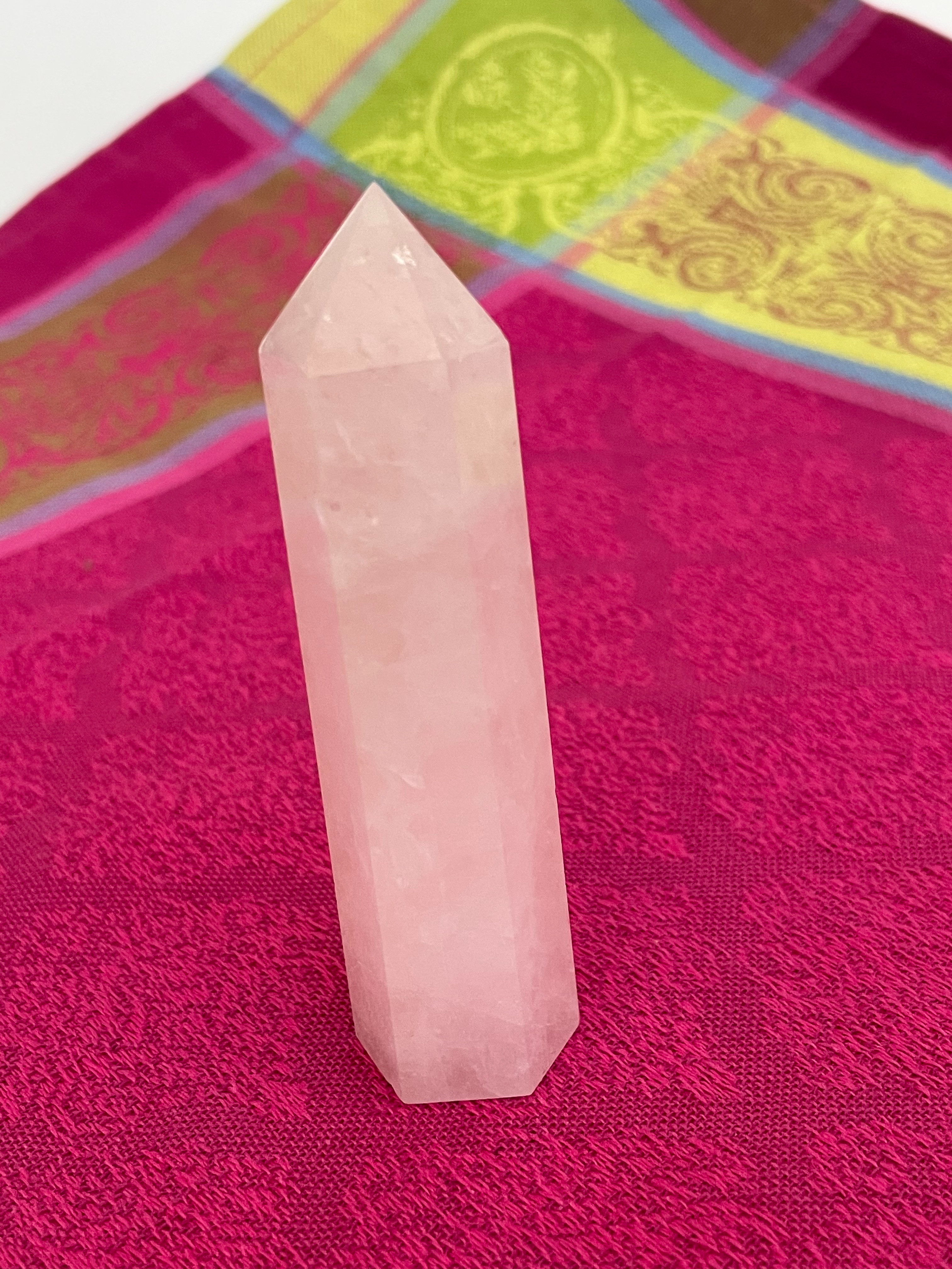 Alternate view. Rose Quartz tower of love 💗. Beautiful rose quartz tower for your altar, for healing or as décor for any room in your home or office. Rose quartz is the ultimate love stone, for love of all types - to attract love and for self-love. It is soothing, enhances compassion, is the best emotional healer, dispels negative energy, opens your heart and so much more. Place this rose quartz tower in your space to radiate a loving vibe all day long. The tower is approximately 3½" long. Cost is $14.