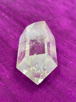 Load image into Gallery viewer, Beautiful clear crystal point holds both beauty and meaning. Quartz is the &quot;most powerful healing and energy amplifier on the planet&quot; (Judy Hall). It is cleansing to organs of the physical body and It also cleanses the soul and it increases your spiritual energy to the highest level (and so much more). Place this on your altar, book shelf, nightstand or table. Use for meditation, healing, cleansing and more. Point is approximately 1½&quot; tall. Cost $10.98.
